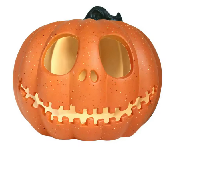 Bright orange Jack‑o‑Lantern with large oval eyes, a triangular nose, and a wide jagged smile.